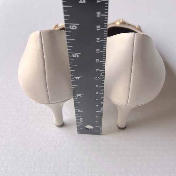 Coach Classy Cream and Tan Pumps. - Picture 7 of 7